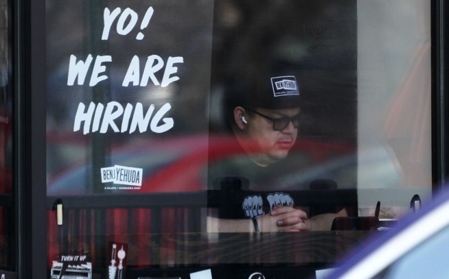 US added 390,000 jobs in May as hiring remained robust