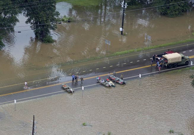 3 killed, thousands rescued in southeast Louisiana floods
