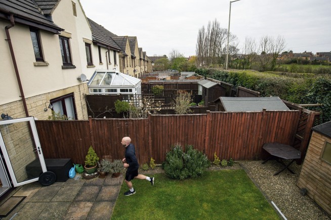 British man runs marathon in backyard during lockdown
