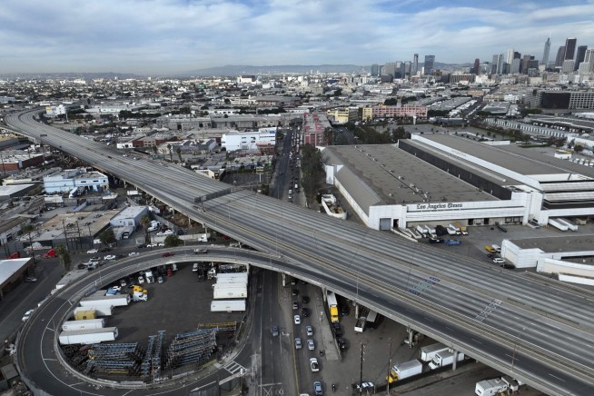 Arson likely caused fire that damaged vital artery of Los Angeles freeway, governor says