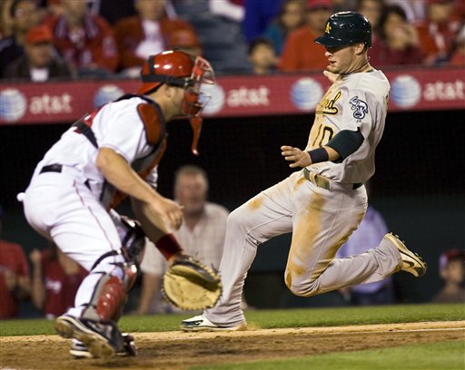 Cust, A's Rout Angels 15-8