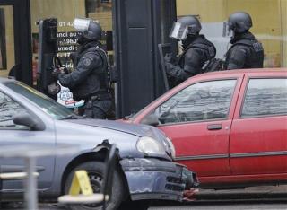 Amid Manhunt, Paris Policewoman Shot Dead