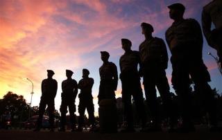 Indonesia Firing Squad Executes 8, Spares Woman