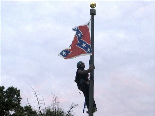 Woman Climbs Pole, Brings Down SC Confederate Flag