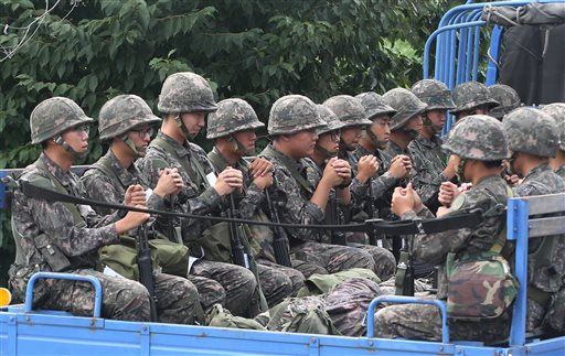 North, South Korea Back Off War Footing at Deadline