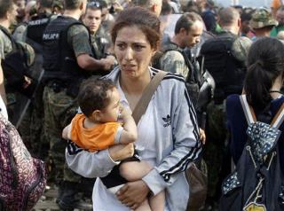 Migrants Storm Border Police, Get Into Macedonia