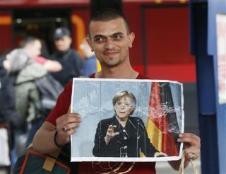 As Thousands Pour In, Germany, Austria Open Arms
