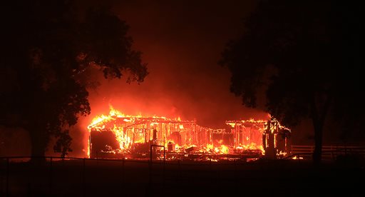 Thousands Flee as Wildfires Sprint Across California