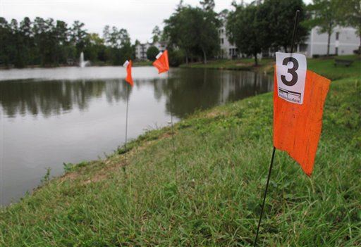 Girl Thrown in Pond Dies; More Charges Loom for Dad