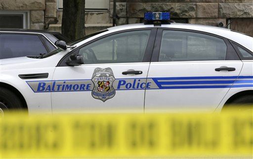 Baltimore Cop Accused of Spitting on Suspect in Video
