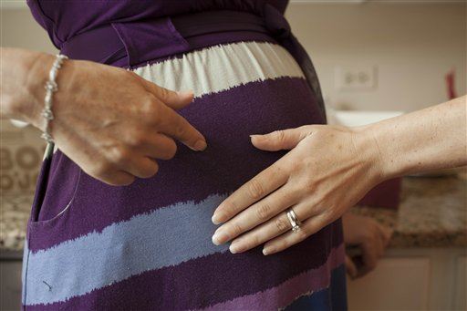 Triplets' Surrogate Sues Bio Dad Who Wanted Abortion