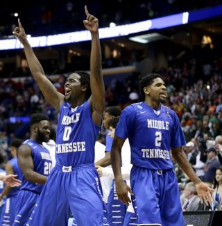 Brackets Busted as Upsets Abound in NCAA Tournament