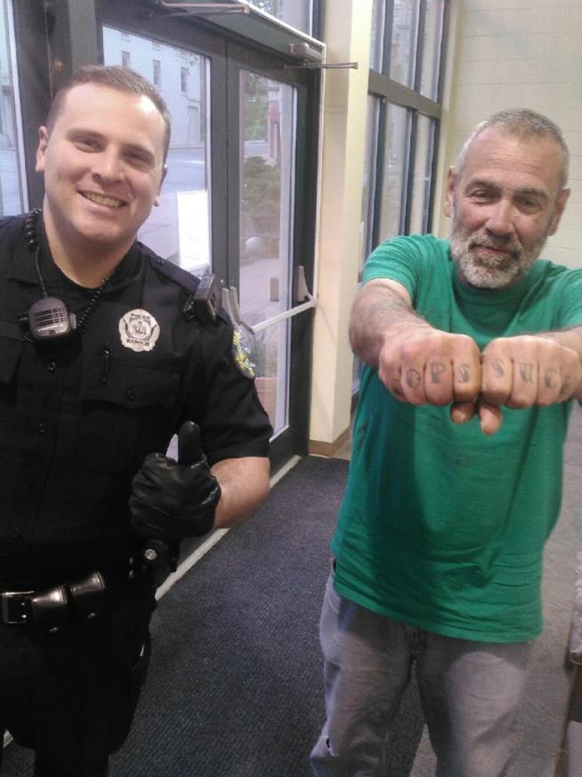 His 'Cops Suck' Tattoo Amuses Cops