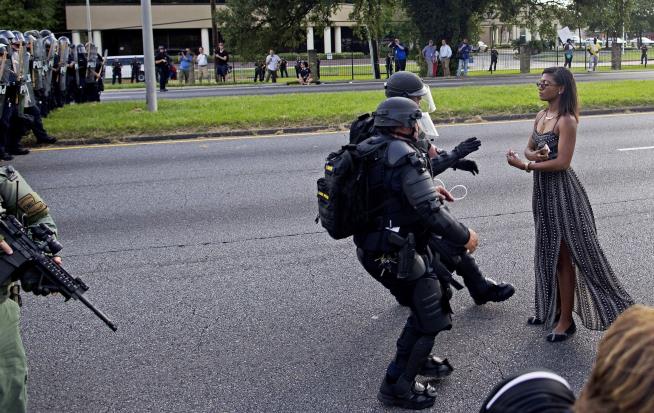 Woman in Iconic Baton Rouge Photo: 'I Am a Vessel'