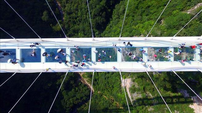 Terrifying Glass-Bottomed Bridge Sets 2 World Records
