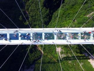 Terrifying Glass-Bottomed Bridge Sets 2 World Records