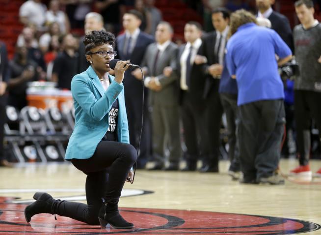 Singer Kneels During Anthem at NBA Game