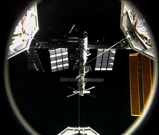 Shuttle Anchors at Space Station