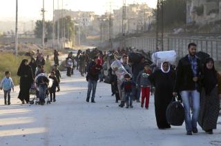 Aleppo Fighting Halts Evacuation