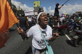 Venezuela's Leader Blames 'Macabre' Obama Plan for Looting, Riots