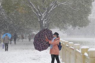 Beijing's Snow Is So Dirty, It Advises Use of Umbrellas