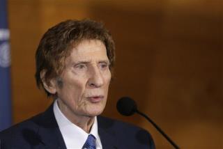 Little Caesars Founder Quietly Paid the Rent of Rosa Parks