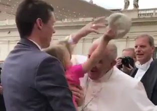 Pope Francis Shares Laugh With Hat-Snatching Toddler