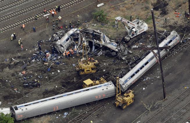 Amtrak Engineer Charged in Crash That Killed 8