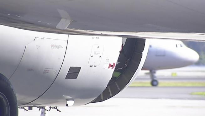 Plane Lands With Gaping Hole in Engine