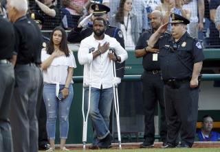 Injured Officer Throws First Pitch at Congressional Baseball Game