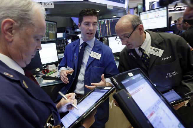 Modest Gains Push Stocks to Record Highs