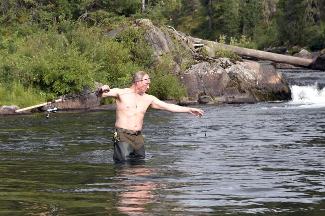 Putin Goes Shirtless Fishing in Siberia