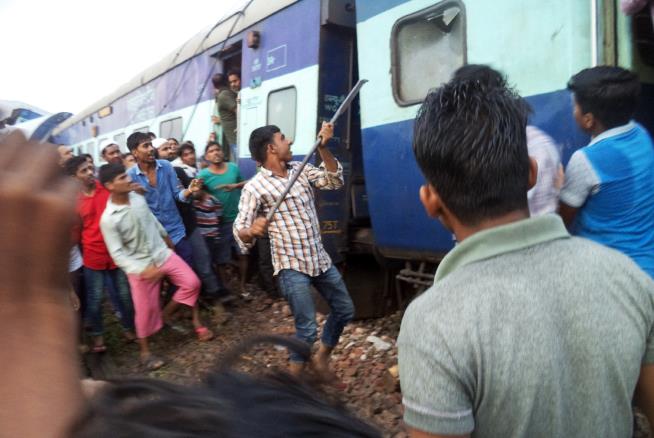 Train Derails in India, Killing at Least 23