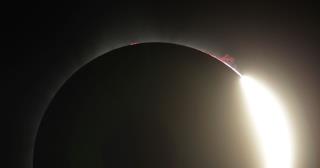 Solar Eclipse Begins Putting On Its Show