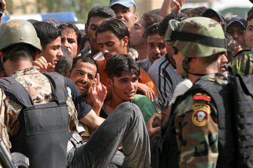 Iraq Gov't Fails Progress Report