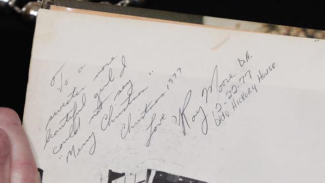 Moore Accuser Refines Story of Yearbook Inscription