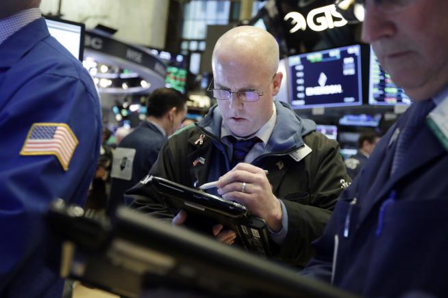 Dow Surges 669 Points