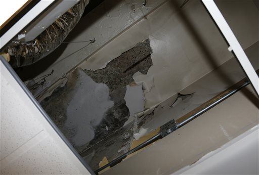 Ex-Boyfriend Falls Through Woman's Living-Room Ceiling