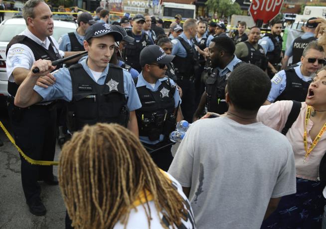 Cops Clash With Protesters After Police Shooting