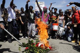 American Flag Is Burned Outside Maxine Waters' Office