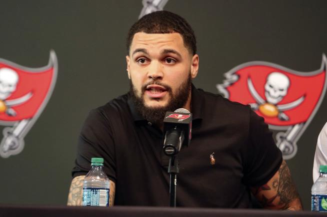 A Jury Awarded Them 4 Cents. Mike Evans Gave Them $11K