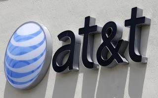 Workers Claim AT&T Went Back on Tax Plan Promise