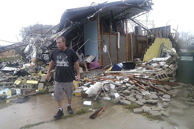 Town 'Littered With Pieces of Houses' in Hurricane's Wake