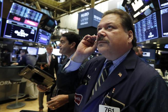 Stocks End a Wobbly Day Broadly Lower