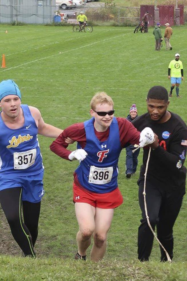 Blind Runner Wins Race With Push From Runner-Up