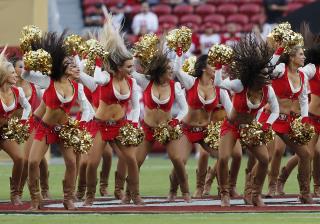NFL First: This Time, Cheerleader Takes a Knee
