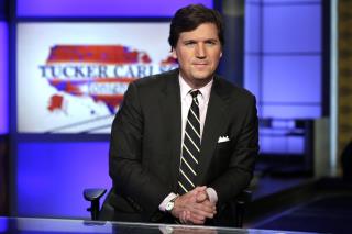 Protesters Give Tucker Carlson's Wife a Fright