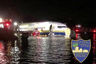 Plane Slides Off Runway Into Florida River