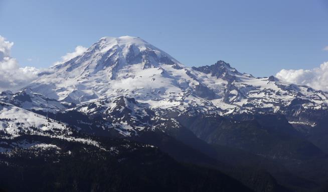 Helicopter Plucks Climbers Near Mount Rainier Summit
