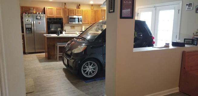 Hurricane Prep: Florida Man Parks Smart Car in Kitchen
